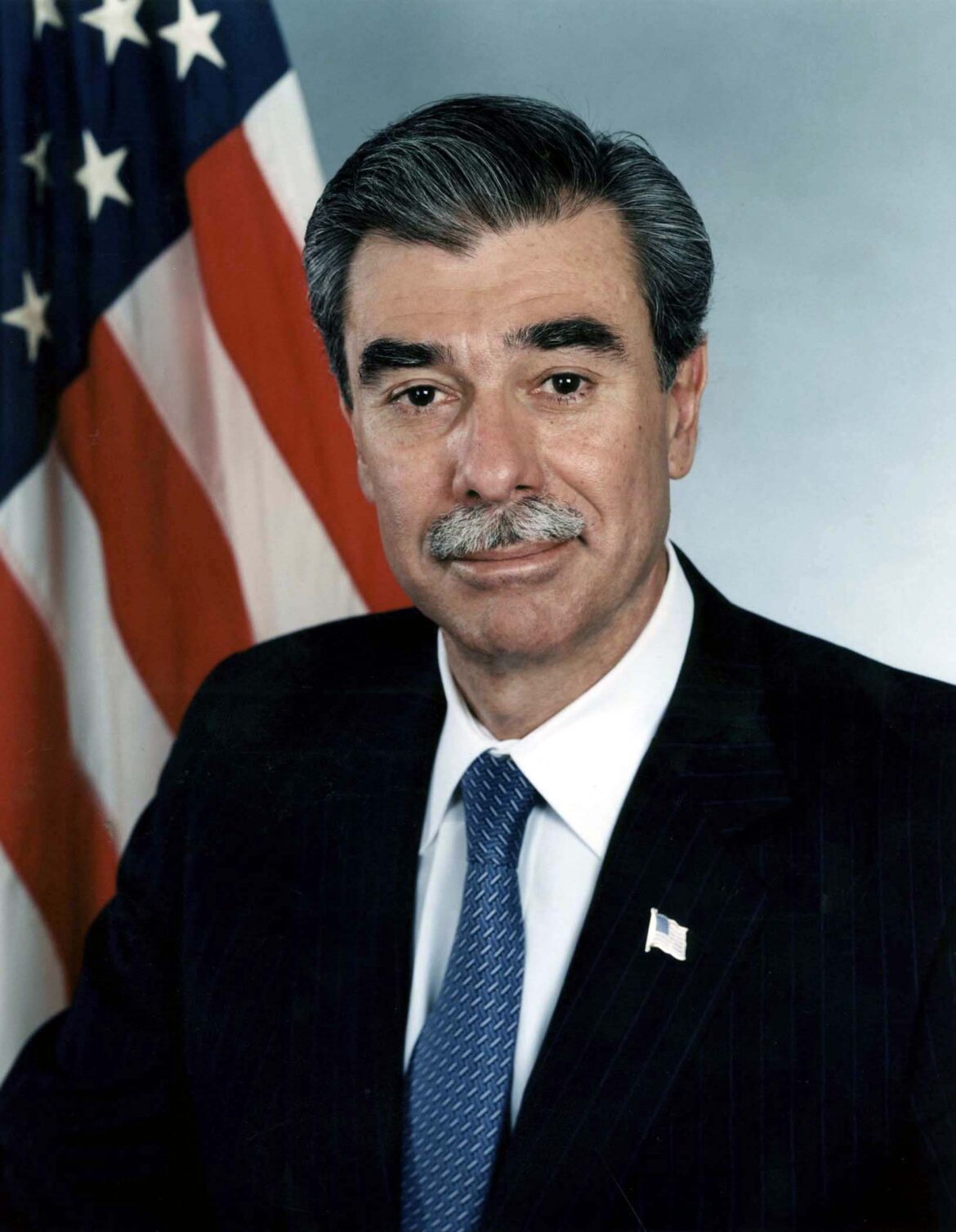 Retrato oficial de Carlos Gutiérrez